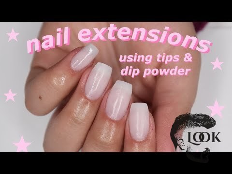 A person demonstrating how to do nail extensions with tips and dip powder